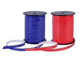 Krullint in rood, blauw, groen, geel, oranje, rood in Raphia en satijn. 